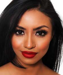 FIlipina woman wearing Argentine Red Tango lipstick by Plum & York