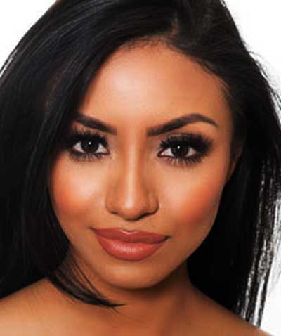 Filipina wearing LA Isla Naranja lipstick by Plum & York