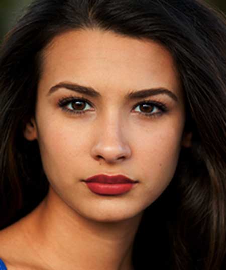 Latina wearing Mexican Fiesta Roja lipstick by Plum & York, red lipstick for olive skin