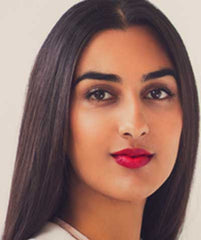 Indian woman wearing Argentine Red Tango lipstick by Plum & York, red lipstick for brown skin