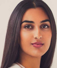 Indian woman wearing Dubai Dust Rose lipstick by Plum & York